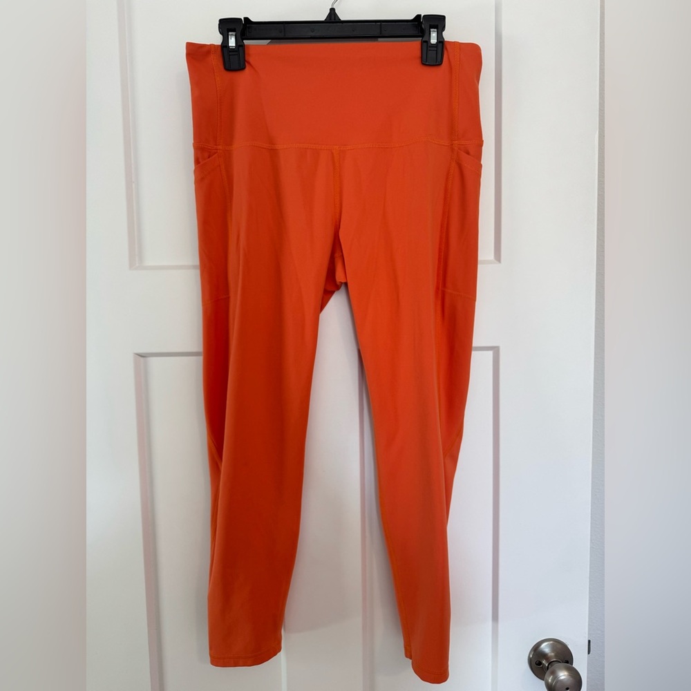 DSG Women's Momentum Ultra High Rise 7/8 Tight leggings in a fresh tangerine